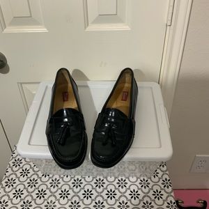 G H Bass Men Tassel Leather Loafers. The color is Black.